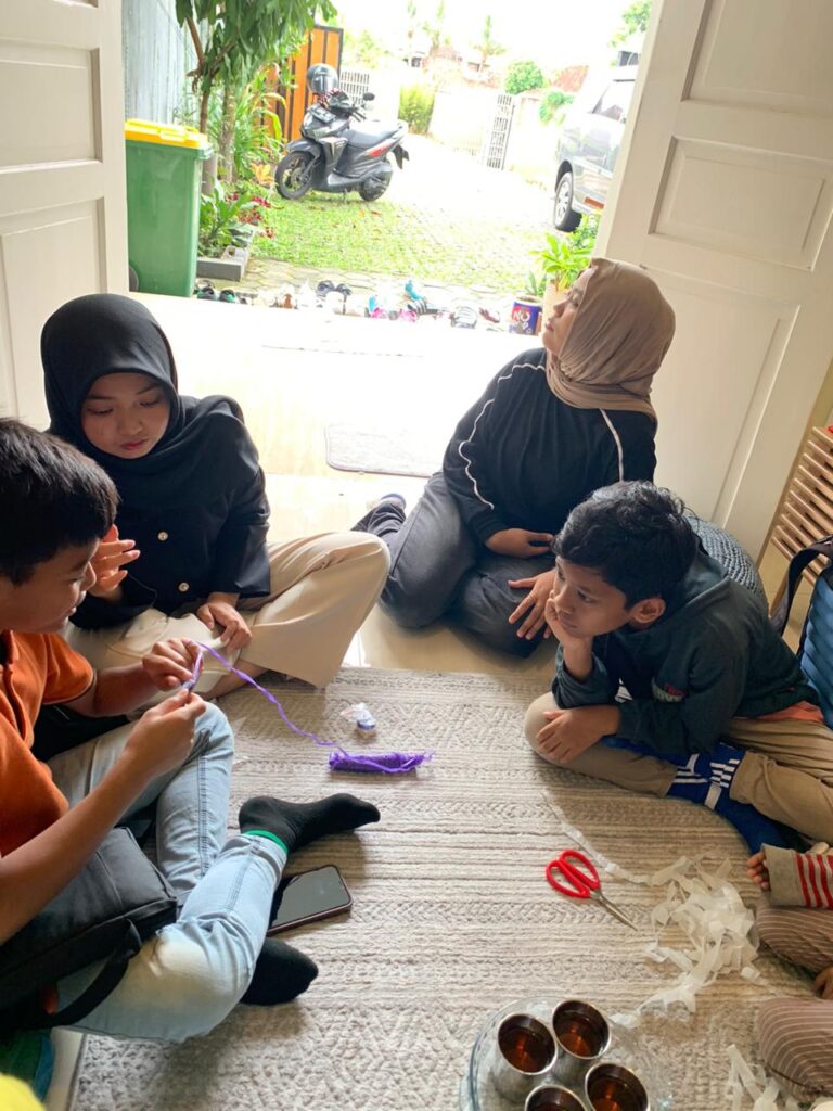 Children participating in a sustainability workshop for kids at Rajut Nusa Bootcamp 2025